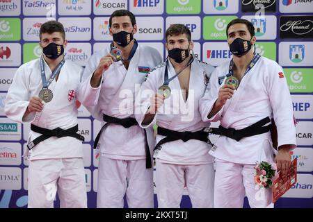 ZAGREB, CROATIA - SEPTEMBER 26: (L-R) Silver medalist Luka Maisuradze of Georgia, gold medalist Mammadali Mehdiyev of Azerbaijan and bronze medalists Wachid Borchashvili of Austria and Khusen Khalmurzaev of Russia during the Men's -90kg medal ceremony on day 3 of the Judo Grand Prix Zagreb 2021 at Arena Zagreb in Zagreb, Croatia on September 26, 2021. Photo: Igor Kralj/PIXSELL Stock Photo