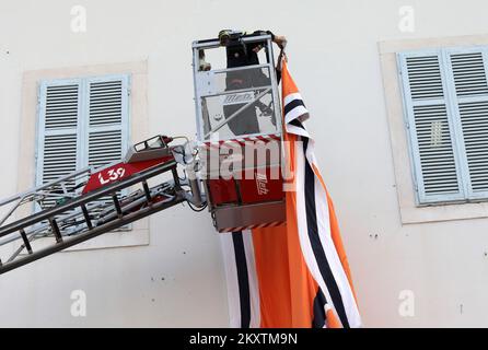 Giant Drazen Petrovic, number 4, basketball jersey of Sibenka basketball club is lifted by a fireman crane at building on the occasion of his 57th birthday in Sibenik , Croatia on October 21, 2021. Photo: Dusko Jaramaz/PIXSELL Stock Photo