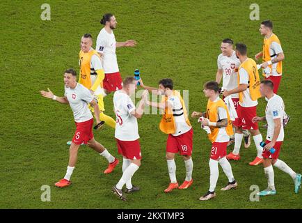 Poland celebrate after the FIFA World Cup Group C match at Stadium 974 in Doha, Qatar. Picture date: Wednesday November 30, 2022. Stock Photo