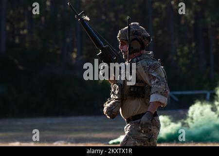 Lt. Gen. Tom Miller, Air Force Sustainment Center commander, is greeted ...