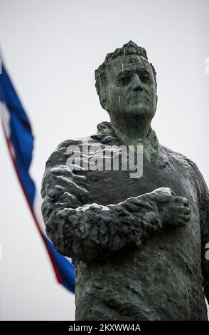 The statue of the first Croatian president Franjo Tudjman is lightly covered with snow, in Zagreb, Croatia, on December 27, 2021. Photo: Slavko Midzor/PIXSELL Stock Photo