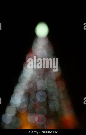 Christmas tree with lights glowing Stock Photo