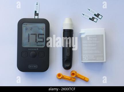 Illustration of Blood Glucose Monitor Kit. Diabetes mellitus, commonly known asÂ diabetes, is a group ofÂ metabolic disordersÂ characterized by aÂ high blood sugarÂ level over a prolonged period of time. Symptoms often includeÂ frequent urination,Â increased thirstÂ andÂ increased appetite. If left untreated, diabetes can causeÂ many health complications. AcuteÂ complications can includeÂ diabetic ketoacidosis,Â hyperosmolar hyperglycemic state, or death. Serious long-term complications includeÂ cardiovascular disease,Â stroke,Â chronic kidney disease,Â foot ulcers,Â damage to the nerves,Â dam Stock Photo