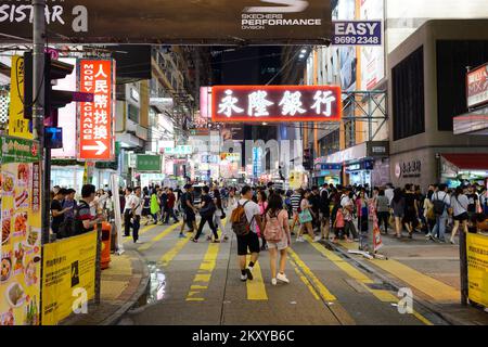 HONG KONG - JUNE 01, 2015: Mongkok area. Mong Kok is characterized by a mixture of old and new multi-story buildings, with shops and restaurants at st Stock Photo