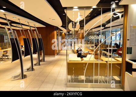 PARIS - AUGUST 08, 2015: McDonald's restaurant interior. McDonald's is the world's largest chain of hamburger fast food restaurants, founded in the Un Stock Photo
