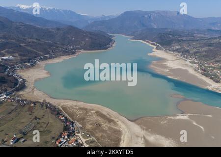 Jablanicko Lake can be seen in the photo in Liscici, Bosnia and Herzegovina on March 21, 2022. After Lake Jablanicko almost completely dried up a few weeks ago, today the situation is a bit better, water is being poured into the riverbed. At the beginning of the second month, the water in Lake Jablanica receded, leaving behind disturbing scenes of exposed lake depressions. Photo: Armin Durgut/PIXSELL Stock Photo