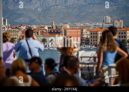 Tourists are seen on a ferry from Split to Supetar on the island of Brac, on June 22, 2022, in Split, Croatia. Photo: Zvonimir Barisin/PIXSELL Stock Photo