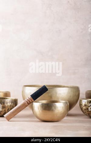 Tibetan singing bowls with sticks used during mantra meditations on ...