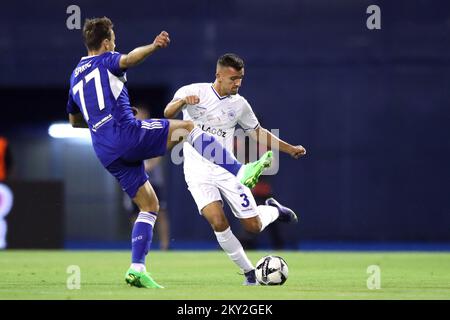 Dario Spikic of Dinamo in action with Blerton Sheji of Shkupi during the 1st leg of second qualifying round of UEFA Champions League between GNK Dinamo Zagreb and FC Shkupi at Maksimir stadium, in Zagreb, Croatia, on July 19, 2022. Photo: Luka Stanzl/PIXSELL Stock Photo