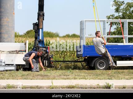 The workers decided to use part of the break to swing on the ropes in Zagreb, Croatia on August 1, 2022. Photo: Zeljko Hladika/PIXSELL Stock Photo