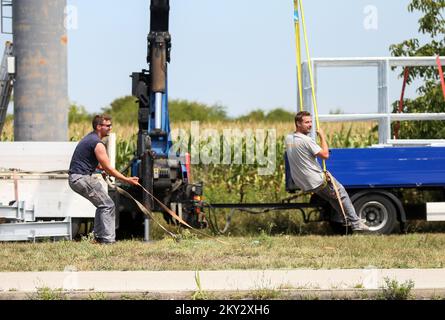 The workers decided to use part of the break to swing on the ropes in Zagreb, Croatia on August 1, 2022. Photo: Zeljko Hladika/PIXSELL Stock Photo