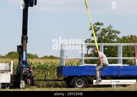 The workers decided to use part of the break to swing on the ropes in Zagreb, Croatia on August 1, 2022. Photo: Zeljko Hladika/PIXSELL Stock Photo