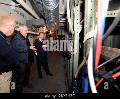 New York, N.Y., Dec. 14, 2012   FEMA Administrator Craig Fugate, center, speaks about mitigation steps to Coney Island Hospital Director of Facilities, Daniel Collins, right, along with FEMA Federal Coordinating Officer Michael Byrne, left. Collins gave a tour of areas that were flooded due to Hurricane Sandy. New York, NY, Dec. 14, 2012--FEMA Administrator Craig Fugate, center, speaks about mitigation steps to Coney Island Hospital Director of Facilities, Daniel Collins,  right, along with FEMA Federal Coordinating Officer Michael Byrne, left.  Collins gave a tour of areas that were flooded d Stock Photo