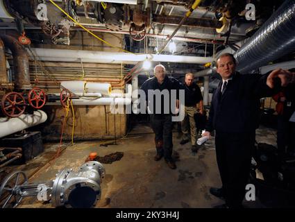 New York, N.Y., Dec. 14, 2012   FEMA Administrator Craig Fugate, left, along with FEMA Federal Coordinating Officer Michael Byrne, center, get a tour of damage caused by Hurricane Sandy at the Coney Island Hospital by Director of Facilities, Daniel Collins. They were joined by hospital administration and were shown areas of the hospital impacted by Hurricane Sandy and were flooded. New York, NY, Dec. 14, 2012--FEMA Administrator Craig Fugate,, left,  along with FEMA Federal Coordinating Officer Michael Byrne, center, get a tour of damage caused by Hurricane Sandy at the Coney Island Hospital b Stock Photo