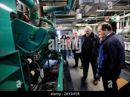 New York, N.Y., Dec. 14, 2012  FEMA Administrator Craig Fugate, second from right, gets a tour of flood damaged areas of Coney Island Hospital by Director of Faciliites, Daniel Collins, right and Senior Vice President of Coney Island Hospital Arthur Wagner, second from right. FEMA officials and senior hospital staff joined the Administrator on the tour.. New York, NY, Dec. 14, 2012--FEMA Administrator Craig Fugate, second from right, gets a tour of flood damaged areas of Coney Island Hospital by Director of Faciliites, Daniel Collins, right and Senior Vice President of Coney Island Hospital Ar Stock Photo