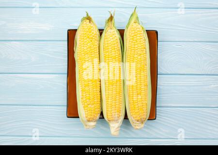 corn group on wood background top view Stock Photo
