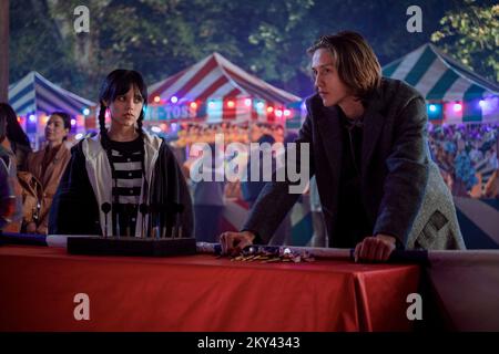 WEDNESDAY, from left: Jenna Ortega (back to camera), Issac Ordonez