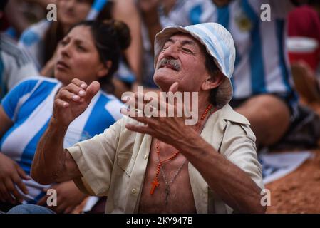 Buenos Aires, Argentina. 30th Nov, 2022. A man reacts as he watches his team's match against Poland. Argentine soccer fans watch their team's match against Poland at the World Cup, hosted by Qatar, in Buenos Aires, Argentina. (Photo by Mariana Nedelcu/SOPA Images/Sipa USA) Credit: Sipa USA/Alamy Live News Stock Photo