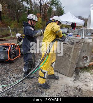 MA-TF1 Urban Search and Rescue members cut and break through slabs of ...