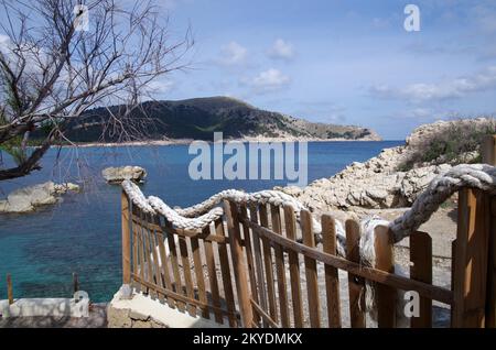 Landscape, sea, fence, sky, coast, stones, rocks, lonely, Majorca, Spain, the special flair of the coastal region of Majorca in springtime Stock Photo