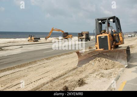 Hurricane Katrina, Biloxi, Miss., September 26, 2005 -- Contractors are working on restoring the beachfront in Biloxi, Mississippi. Hurricane Katrina caused extensive damage all along the Mississippi gulf coast. Stock Photo