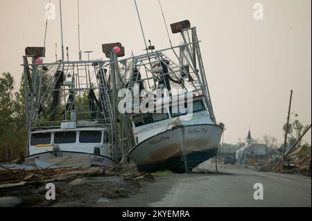 Hurricane Katrina, Plaquemines Parish, LA, 9/21/2005 -- Two fishing boats came to rest on a main road of Plaquemines Parish. FEMA photo/Andrea Booher Stock Photo