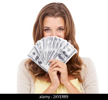 Shes a wealthy young woman. A beautiful young money holding money isolated on white. Stock Photo