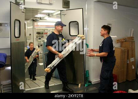 Hurricane Katrina, Plaquemines Parish, LA, November 7, 2005 -- Medical professionals stock crutches inside the innovative Mobile Medical Unit along State Route 23. Stock Photo