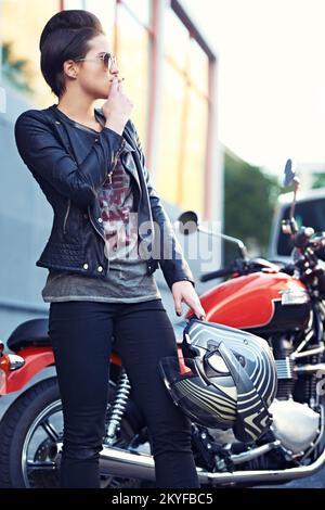 Young punk rocker smoking cigarette Stock Photo - Alamy