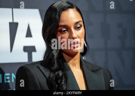 Amina Muaddi attends the 2022 Footwear News Achievement Awards at Cipriani South Street in New York on November 30, 2022 Stock Photo