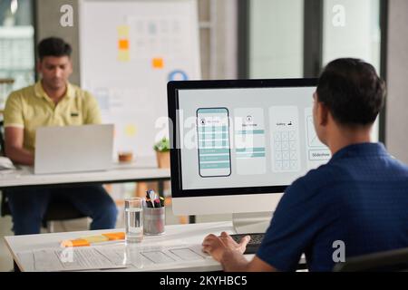 UX Designer working on interface of new mobile applciation Stock Photo