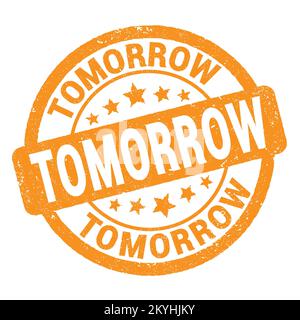 TOMORROW text written on orange grungy stamp sign. Stock Photo