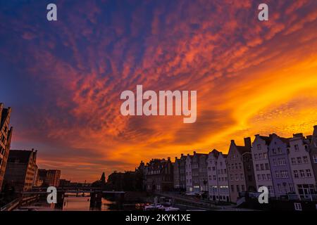 Twilight sky above city skyline of Gdansk in Poland. Stock Photo