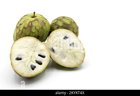 Three custard apples isolated on white background copia Stock Photo