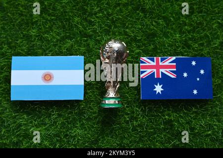 December 1, 2022, Doha Qatar. Flags of participants Round of 16 FIFA World Cup national teams of Australia and Argentina on the green lawn Stock Photo