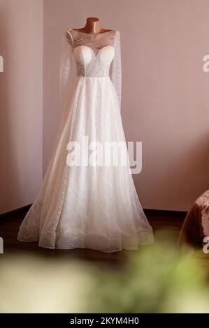 A white wedding dress for the bride on her wedding day. Stock Photo