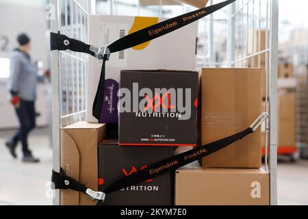 WESTZAAN - Employees of post and parcel delivery company PostNL sort parcels in the parcel sorting centre. This is one of the busiest times of the year leading up to Christmas. ANP BAS CZERWINSKI netherlands out - belgium out Stock Photo