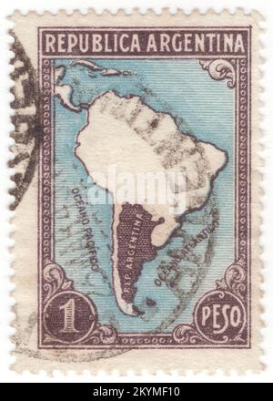 ARGENTINA - 1937: 1 peso brown-black and light blue postage stamp depicting silhouette of Argentina on the map of South America. Argentine Republic, is a country in the southern half of South America. Argentina covers an area of 2,780,400 km2 (1,073,500 sq mi), making it the eighth-largest country in the world. It shares the bulk of the Southern Cone with Chile to the west, and is also bordered by Bolivia and Paraguay to the north, Brazil to the northeast, Uruguay and the South Atlantic Ocean to the east, and the Drake Passage to the south Stock Photo