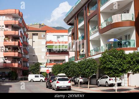 Alanya, Turkey-circa Oct, 2020: Modern apartment buildings with wide balconies are on the street of Alanya, Turkey Stock Photo
