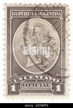 ARGENTINA - 1901 December 1: 1 centavo grey Official stamp depicting Liberty Head. Libertas is the Roman goddess and personification of liberty. She became a politicised figure in the Late Republic, featured on coins supporting the populares faction, and later those of the assassins of Julius Caesar. Nonetheless, she sometimes appears on coins from the imperial period, such as Galba's 'Freedom of the People' coins during his short reign after the death of Nero. She is usually portrayed with two accoutrements: the rod and the soft pileus, which she holds out, rather than wears Stock Photo