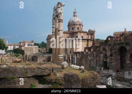 Rome, Italy - view of architectural ruins at Roman Forum. Heart of Ancient Rome. Plaza with government buildings. Roman Empire political center. Stock Photo