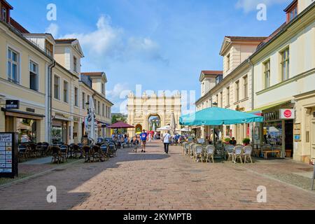 Street scenario of Brandenburg Street looking towards Brandenburg Gate in Potsdam, Brandenburg, Germany, August 7, 2021. Stock Photo