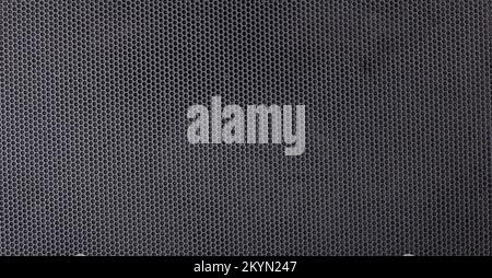 Fine mesh plastic mesh for texture and background. Black background of pentagonal cells - honeycombs. Stock Photo