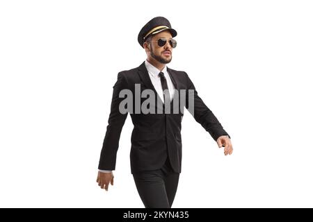 Chauffeur in a uniform walking isolated on white background Stock Photo