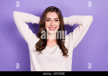 Photo portrait of funny charming smiling relaxed brunette hair businesswoman boss hands head touch nape relax isolated on violet color background Stock Photo