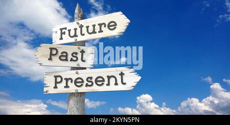 Future, past, present - wooden signpost with three arrows Stock Photo