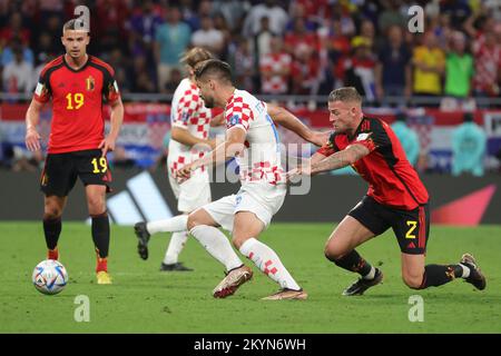 Doha, Qatar, 01/12/2022, Belgium's Leander Dendoncker, Croatian Ivan Perisic and Belgium's Toby Alderweireld pictured in action during a soccer game between Belgium's national team the Red Devils and Croatia, the third and last game in Group F of the FIFA 2022 World Cup in Al Rayyan, State of Qatar on Thursday 01 December 2022. BELGA PHOTO VIRGINIE LEFOUR Credit: Belga News Agency/Alamy Live News Stock Photo