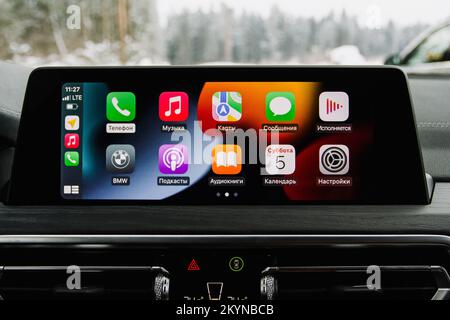 MOSCOW, RUSSIA - FEBRUARY 05, 2022 Car media close up view. CarPlay on the screen. Homescreen. Stock Photo