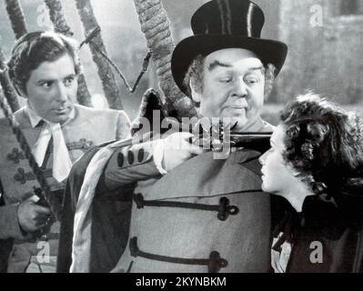 JAMAICA INN 1939 Mayflower Productions film with from left:  Robert Newton, Charles Laughton,Maureen O'Hara. Directed by Alfred Hitchcock. Stock Photo