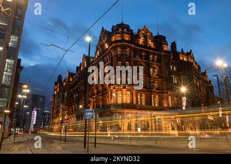Light trails from the Trams and traffic in front of the Midland Hotel in St.Peter's Square in the Manchester City Centre. Stock Photo